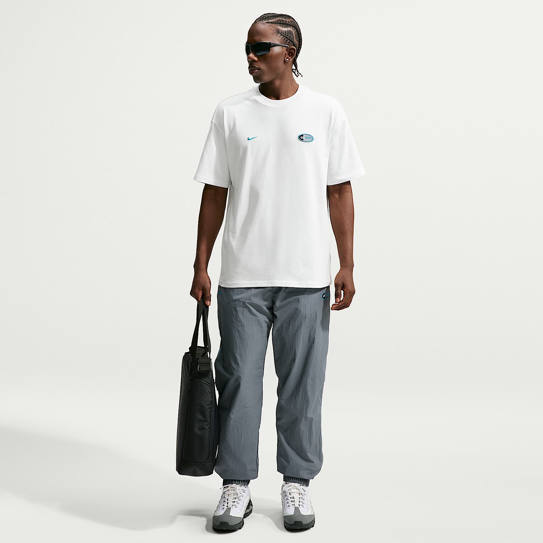 Nike Sportswear Air Max 95 Men's Woven Trousers. Nike SK